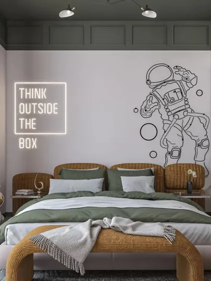 Another view of the space-themed room, showing the glass-front wardrobe and ample floor space for play. The design is a perfect blend of fun decor and practical, stylish furniture.