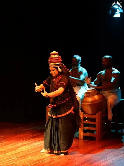 A dancer performs in the traditional costume of Nangiar Koothu.