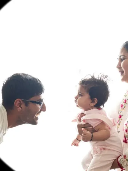 These backlit silhouette portraits create a dramatic and emotional image, focusing on the shape and connection between family members without distraction.