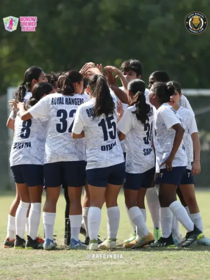 Together, we are stronger. This is our team in a pre-game huddle, a moment of unity and focus before heading into battle in the Women's Premier League.