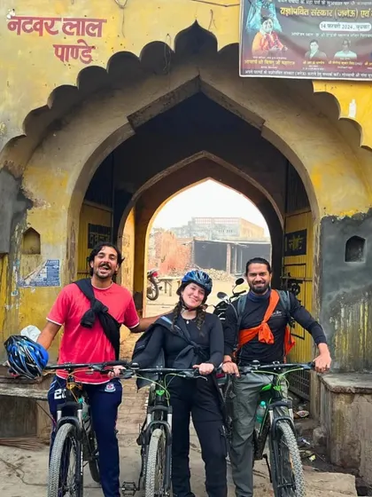 Posing at a historic gateway in the Braj region during our Delhi-Agra cycle tour. Every stop is a photo opportunity and a chance to soak in the timeless atmosphere of rural India.