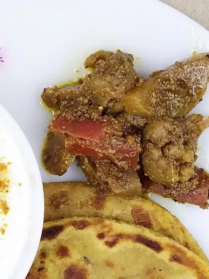 A closer look at the Mix Veg Achaar, showing the different vegetables like cauliflower and carrots pickled in a blend of spices, vinegar, and mustard oil. It can last on your shelf for up to a year.
