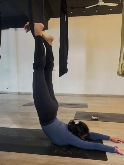 This supported plow pose is an excellent way to stretch the entire spine and shoulders while engaging the core for stability.
