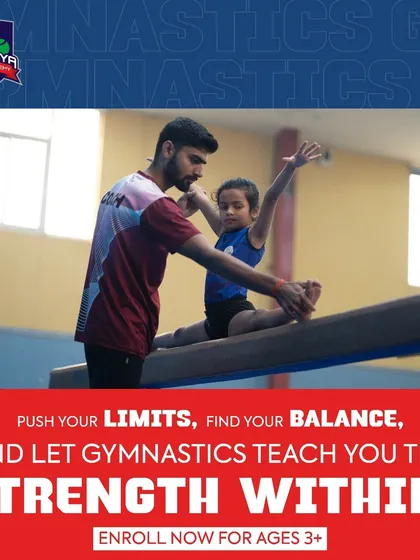 Personal attention is key. Here, I am guiding a young gymnast on the balance beam, helping her find her balance and push her limits safely. My program is open for children ages three and up.