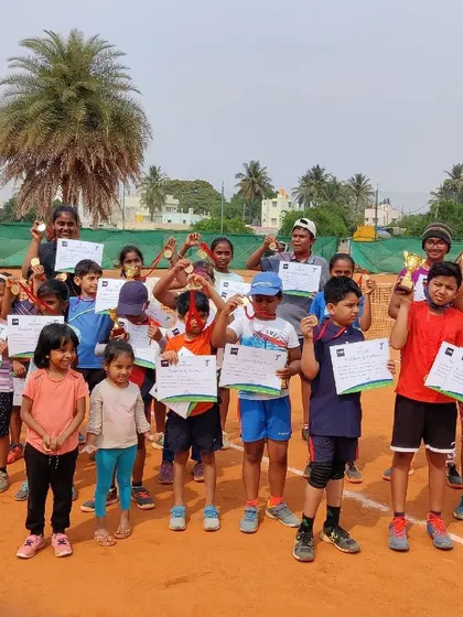 A court full of champions. We love celebrating the success of every player at our beginner tournaments, where everyone gets to experience match play and showcase their skills.