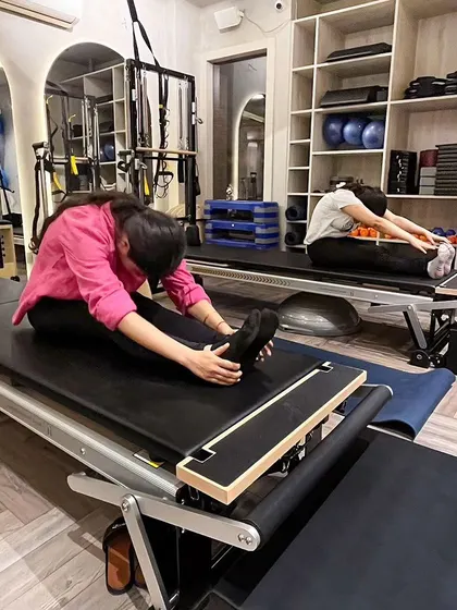 A deep forward fold on the Reformer helps to release tension in the hamstrings and lower back, improving overall flexibility.