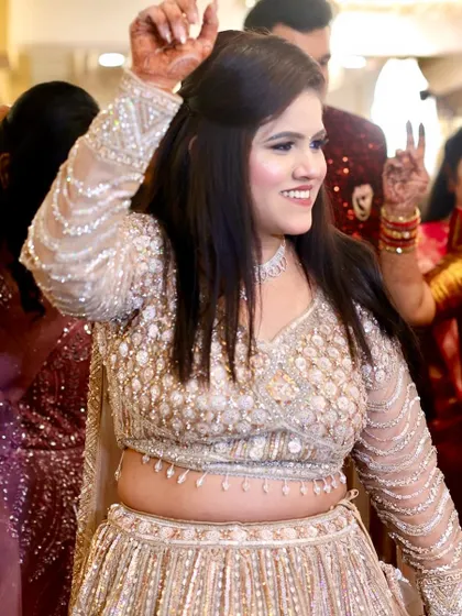 Dancing with joy! The makeup is designed to last through a whole night of celebration.