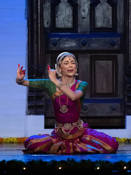 A moment of expressive storytelling from the Kalāmārga 2024 festival. The set, with the traditional door, adds to the atmosphere of Vrindavan where the story unfolds.