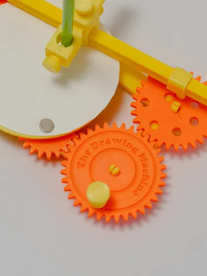 A close-up of our 3D printed cycloid drawing machine. The intricate gears are designed to create beautiful geometric patterns, providing a hands-on lesson in math and physics.