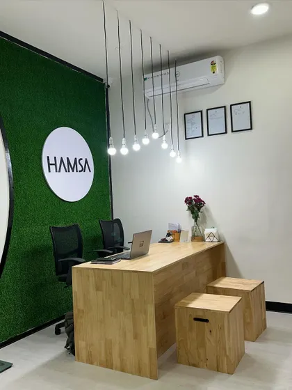 The reception area at our JP Nagar 2nd Phase studio. We believe in creating a warm and inviting atmosphere from the moment you walk in.