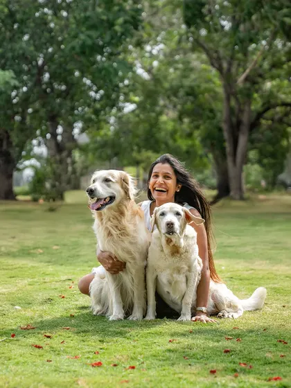 A joyful portrait of Ice and her human sister. Even in her golden years, Ice's happy spirit shines bright. It's a reminder to cherish every moment with our senior pets.