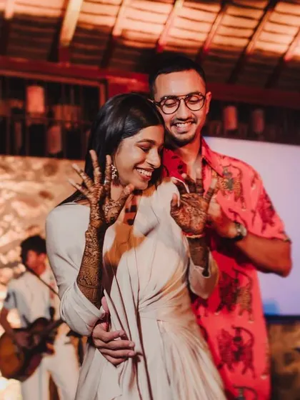 The couple sharing a dance at their reception. We focus on capturing the joy and connection between you, even in the middle of a lively party.