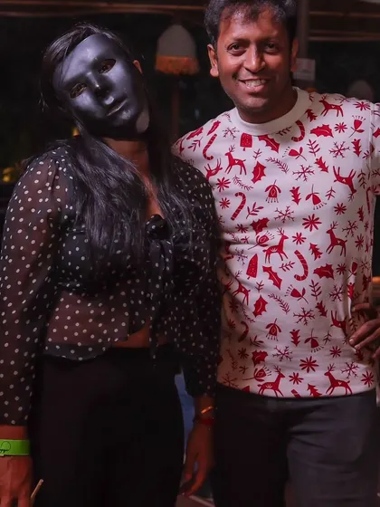 Another photo of guests enjoying the costume party atmosphere.