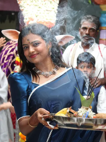 Sonu participating in a traditional ceremony, looking serene and beautiful in our custom creation.