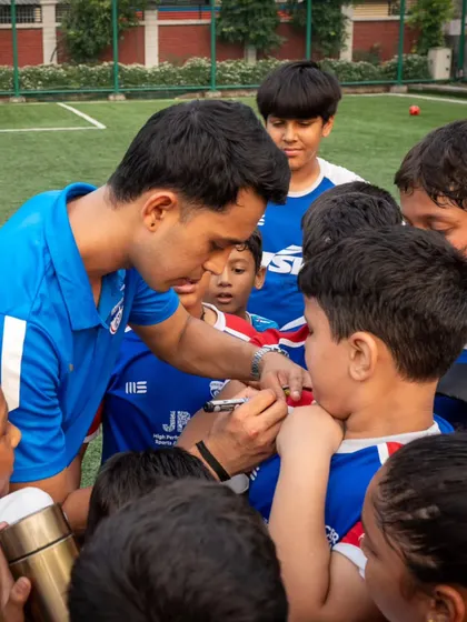 A moment to remember. Rohit Danu signs an autograph for an excited young fan in Dehradun.