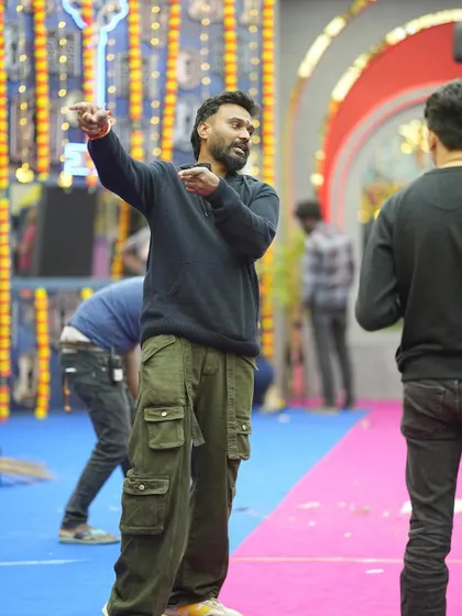 Directing the dancers on the Bigg Boss Kannada set. My job is to make sure every artist and background dancer moves as one to create a visually stunning performance.