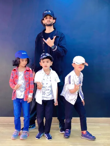 Posing like pros. Our instructor Akshay with some of our youngest and most stylish dancers from the 5-6 pm kids' class. We encourage them to be confident both on and off the dance floor.