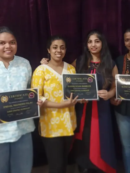Students from our one-day workshop proudly displaying their certificates of completion.