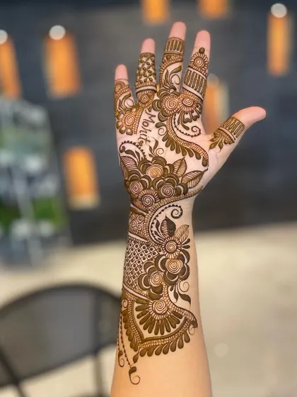 An elegant design for a guest, featuring the name 'Mohit' hidden within the floral patterns.