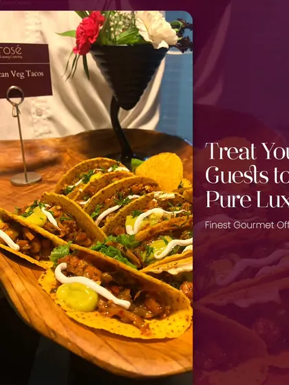 A server presents a platter of Mexican Veg Tacos. We offer a wide range of international cuisines and can customize our menus to provide the finest gourmet offerings for your guests.