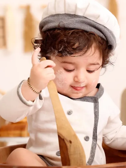 Cooking up some cuteness with my 'Little Chef' theme. These sessions are filled with messy fun and adorable expressions. It’s a perfect way to capture your toddler’s curious and playful spirit in a unique setting.