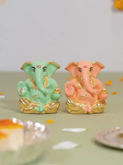 A pair of our pastel Ganesha idols in mint green and soft pink. They make a wonderful set for gifting or for creating a balanced and colorful display in your home.