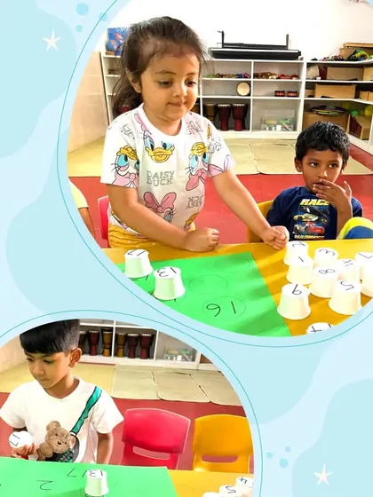 Children at our summer camp are engaged in a number matching game using paper cups. This playful activity turns number recognition into a fun game of hide-and-seek.