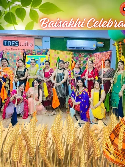 Our members posing with props during the Baisakhi celebration, ready for a traditional dance performance.