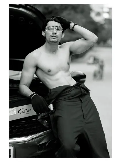 A conceptual men's portrait with a narrative. Shot in black and white, this image of a mechanic creates a rugged, cinematic feel, perfect for storytelling or a character-driven portfolio.