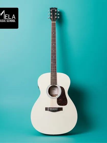 This sleek acoustic guitar is the perfect instrument for singer-songwriters and folk musicians. Our lessons cover everything from basic strumming to fingerstyle playing.