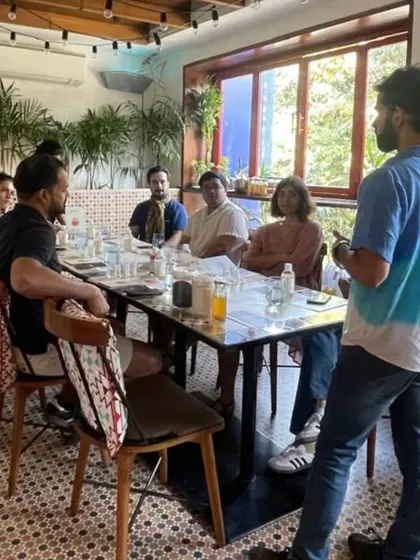 A candid moment from one of our kombucha brewing sessions. We foster a community atmosphere where people can learn, ask questions, and share their curiosity.