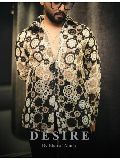 Elevate your style with this warm-toned, textured designer shirt. It's a look that is both bold and refined.