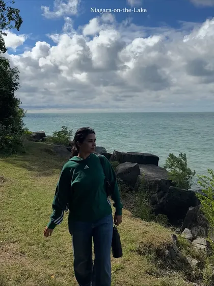 A candid shot walking by the water at Niagara-on-the-Lake, with beautiful clouds overhead.
