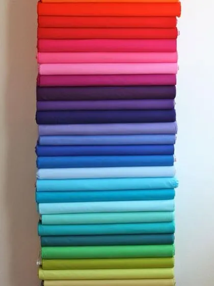 A glimpse of my work in progress. These colorful rolls of fabric are waiting to be transformed into beautiful blouses and sarees, each with its own story.