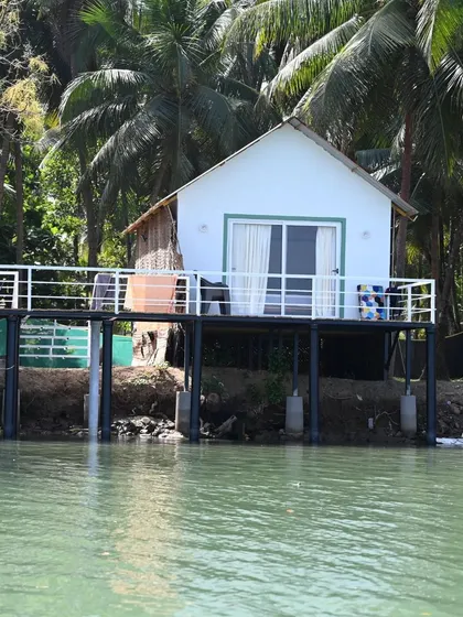 A picturesque water villa, a sight we often see during our backwater explorations.