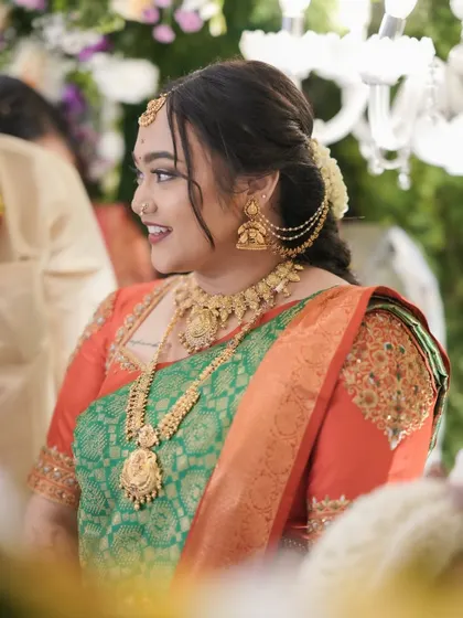 A beautiful portrait of my client Tejaswini, her custom blouse with the 'TS' initial tassel peeking through.
