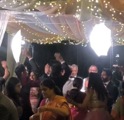 A moment of high energy with the groom and his friends.