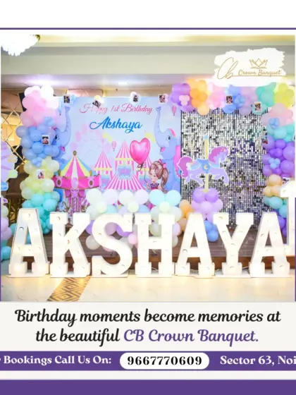 A vibrant circus-themed first birthday backdrop. The colorful decor, complete with a carousel horse and light-up name, creates a playful and exciting atmosphere for a child's party.
