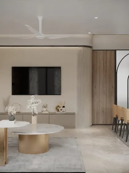 A beautiful example of textured minimalism in a living and dining area. I used fluted wall panels, wood accents, and furniture with clean lines and brass details to create a calm yet interesting space.