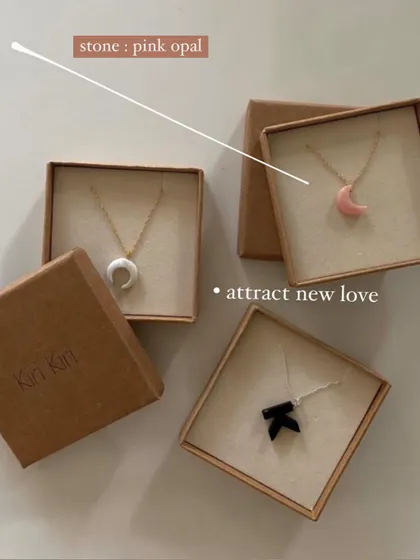 My 'āśra' Pink Opal luna pendant, a stone for inspiration and happy dreams, is shown here in its gift box. It's a perfect piece to attract new love.