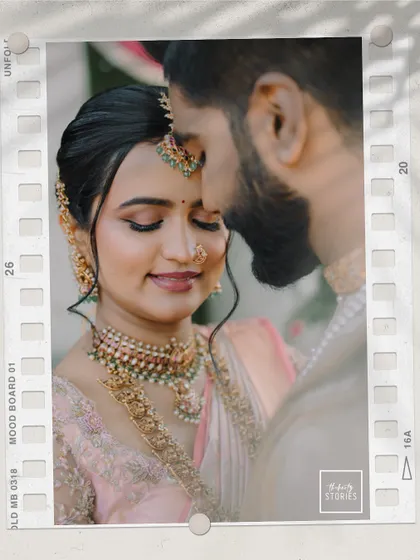 A quiet moment of togetherness for the couple. The film-strip style edit adds a touch of nostalgia to this beautiful South Indian wedding portrait, emphasizing their deep connection.