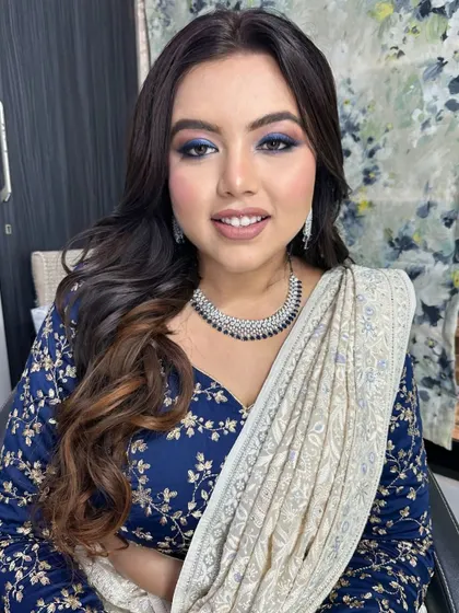 A direct look at this stunning blue smokey eye. I carefully blended multiple shades of blue and black to create this depth and dimension, making her eyes the center of attention.