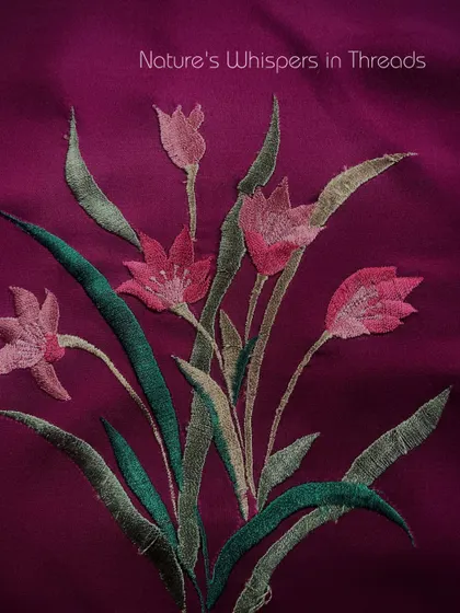 Nature's embrace inspires my delicate embroideries. Here, a bouquet of tulips is woven with thread, telling a tale of flora and fauna.