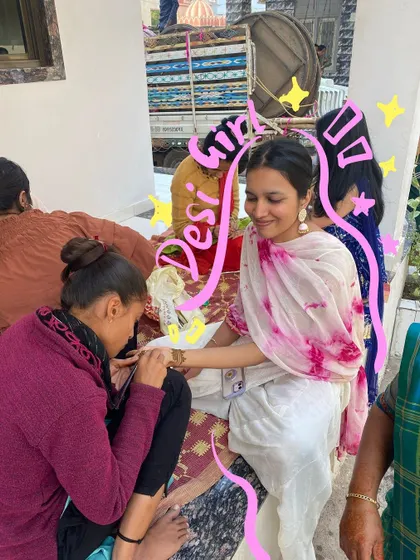 A desi girl moment getting my mehendi done, with doodles that add a celebratory feel.