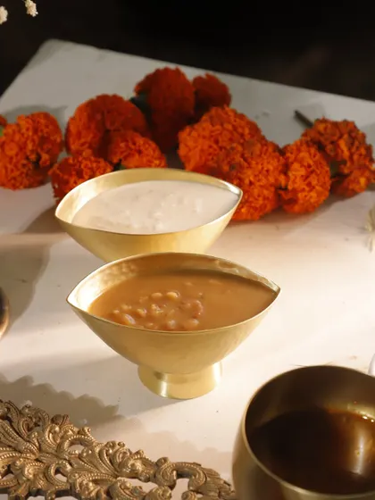 A closer look at the two kings of Kerala desserts: Ada Pradhaman, made with rice flakes and jaggery, and Palada Payasam, a delicate milk-based pudding. A truly sweet dilemma.