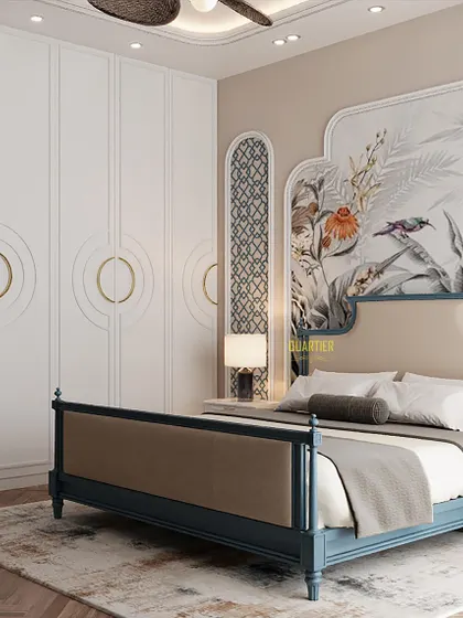 This view of the Indochine master bedroom shows the full-height wardrobe with custom circular handles. The white PU finish provides a clean contrast to the rich textures and patterns in the rest of the room.