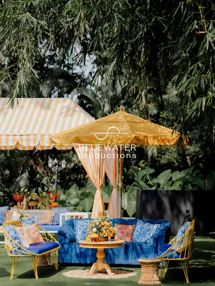 Another angle of the colorful outdoor lounge, showing the mix of textures and patterns that bring the 'Dolce Vita' theme to life.
