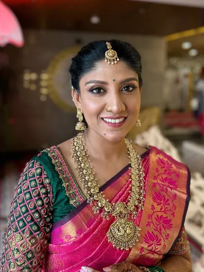 A beautiful, happy portrait of the bride. The makeup highlights her features with a natural finish, proving that bridal makeup can be glamorous without feeling heavy.
