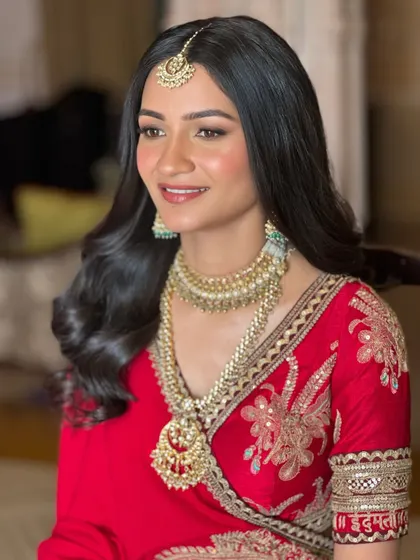 A beautiful portrait of Aashna. Her skin is glowing, and her eyes are defined just enough to make them pop while keeping the overall look minimal and fresh.