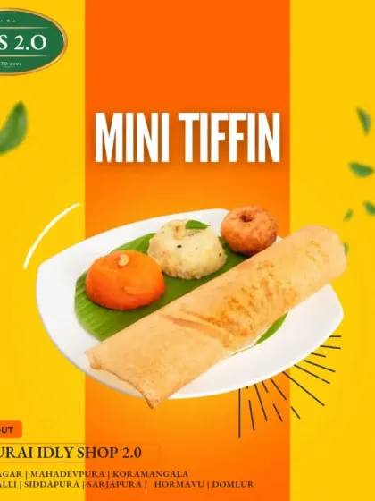 Our Mini Tiffin is a complete meal on one plate. It includes a mini dosa, vada, upma, and kesari, offering a delightful variety of our best tiffin items.